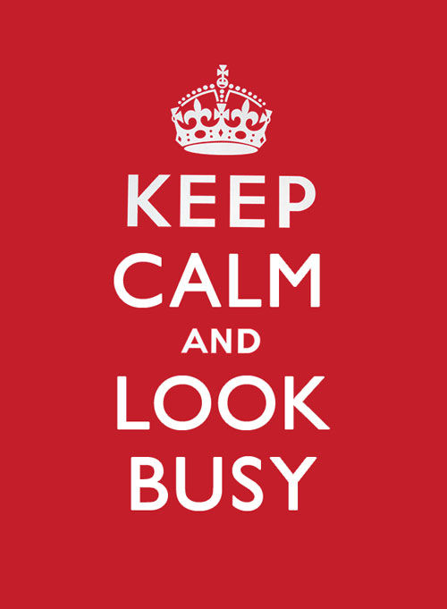 Image with pink background and white text, in the style of the British WW1 "Keep Calm and Carry On" poster.  Text reads "Keep Calm and Look Busy".